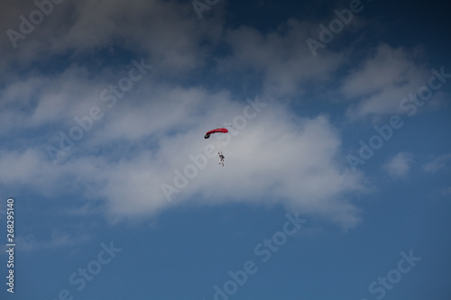 Skydive, people in the sky, under clouds