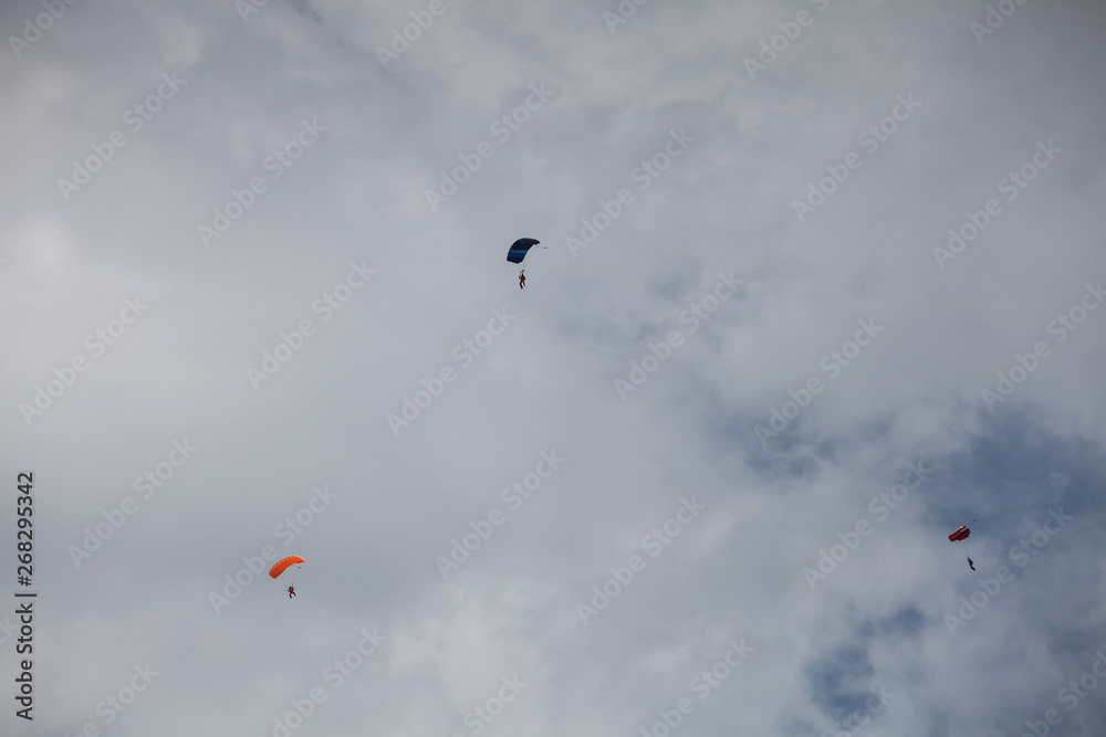Skydive, people in the sky, under clouds Skydive, people in the sky, under clouds