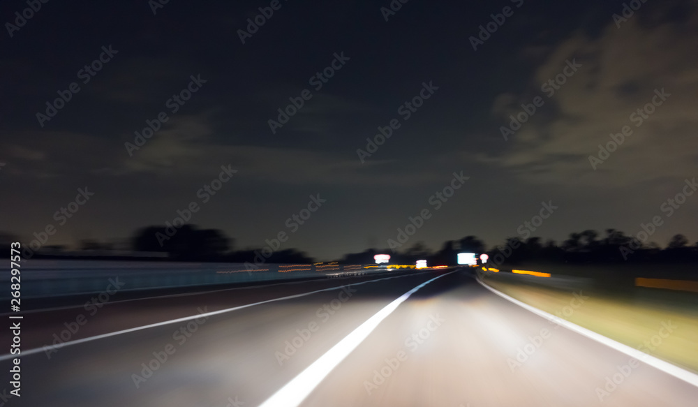 Fototapeta premium Car Trails on a Highway by Night