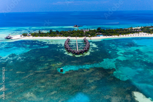 Aerial view,  island Olhuveli with Waterbungalows, South Male Atoll, Maldives photo