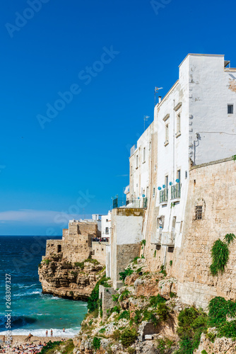 Rough sea on the coast of Puglia. Enchantment of Polignano a Mare. Italy