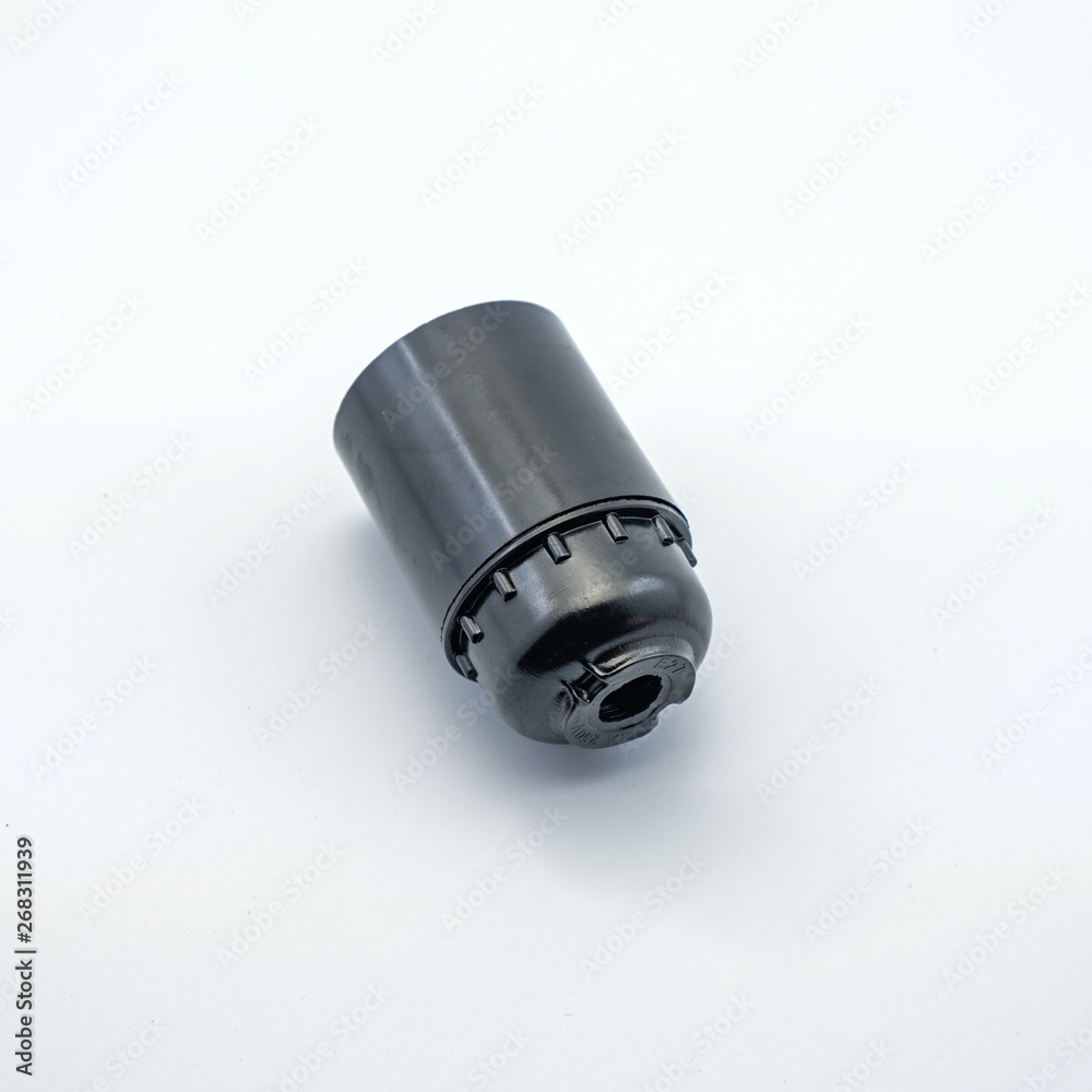 The photo on a white background of an electric lampholder for mounting electrics. Perfect for filling the catalog of a modern iniernet store on the site. The photo on a white background of an electric lampholder for mounting electrics. Perfect for filling the catalog of a modern iniernet store on the site.