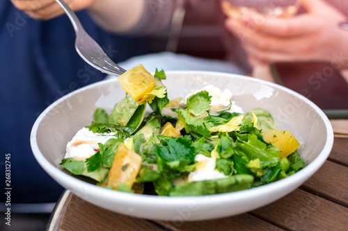 Wallpaper Mural Fresh salad in a plate of vegetables and greens with mozzarella cheese pieces. Copy space Torontodigital.ca