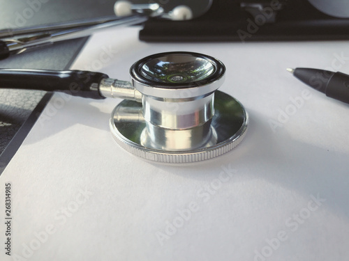 Medical and health care concept - Stethoscope on a clipboard.