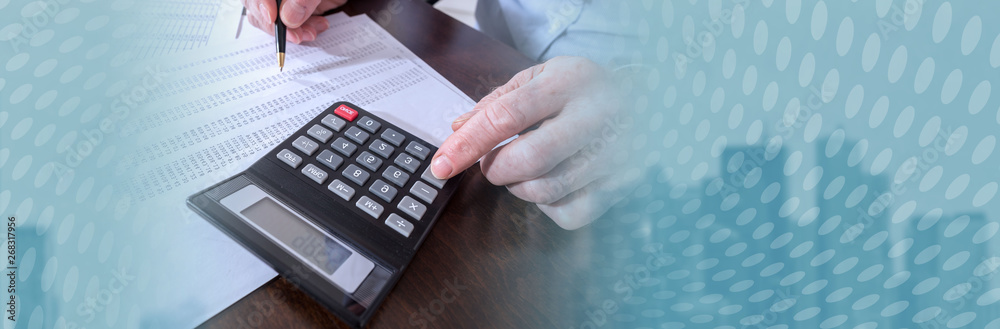 Man doing his accounting. panoramic banner Man doing his accounting. panoramic banner