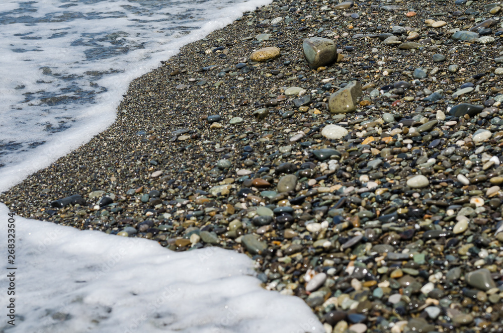 background of the coast with pebbles background of the coast with pebbles
