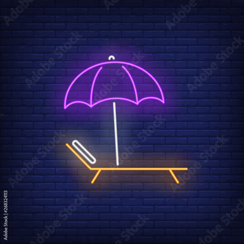 Bright beach umbrella and chaise longue neon sign. Summer, holiday, vacation, resort design. Night bright neon sign, colorful billboard, light banner. Vector illustration in neon style.