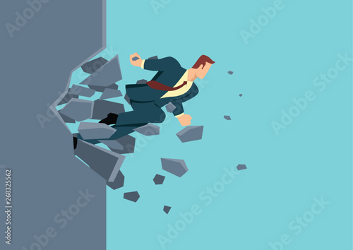Businessman breaking the wall