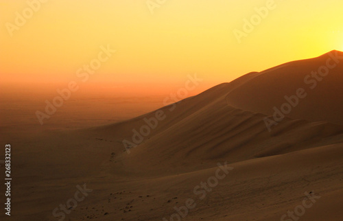 The highest sand dunes in the world at sunset in Namib Desert  in the Namib-Nacluft National Park in Namibia. Sossusvlei