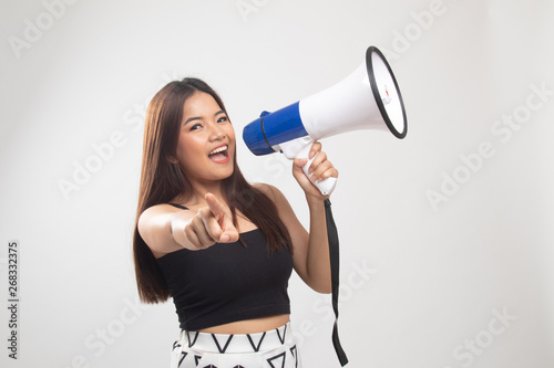 Beautiful young Asian woman announce with megaphone.