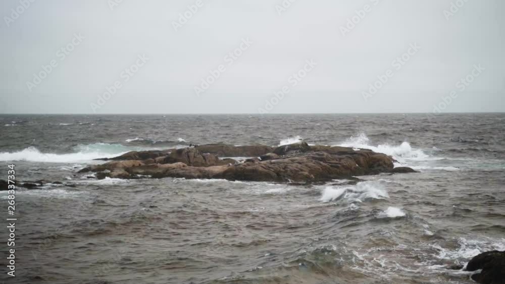 Static shot of the ocean and waves hitting the rocks at the coast of Nova Scotia, Canada. Static shot of the ocean and waves hitting the rocks at the coast of Nova Scotia, Canada.