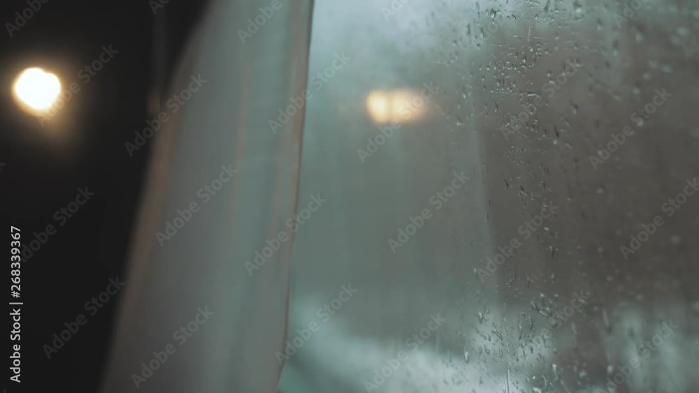 concept journey railway train. rain rides by rail. Winter forest trees in Russia lifestyle . railroad view from the inside of a carriage raindrops on glass on the window. concept interior railroad concept journey railway train. rain rides by rail. Winter forest trees in Russia lifestyle . railroad view from the inside of a carriage raindrops on glass on the window. concept interior railroad