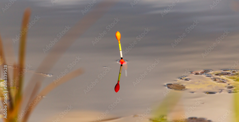 Fisherman float on the surface of the water