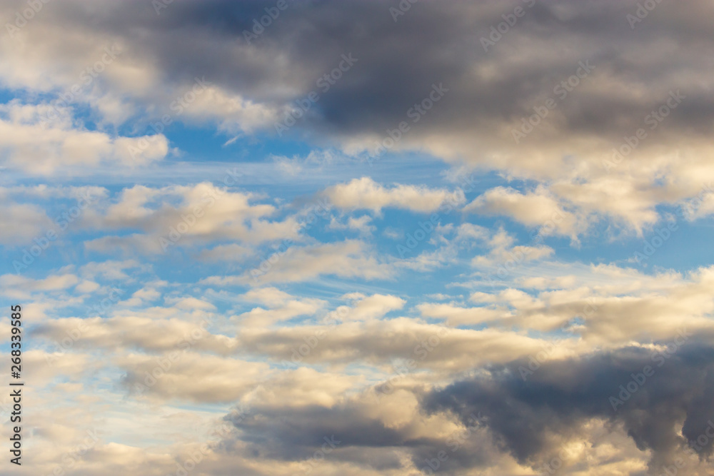 Fototapeta premium Clouds in the sky at sunset as a background