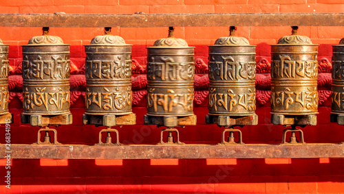 traditional Tibetan wheel with mantra OM Mani Padme Hum location kathmandu Swayambhunath temple olso know as Monkey temple