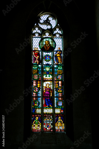Beautiful stained glass church window depicting Psalm 119:46 from the St. James Church (St. Jakob), a historic Protestant church in Rothenburg ob der Tauber, Germany.