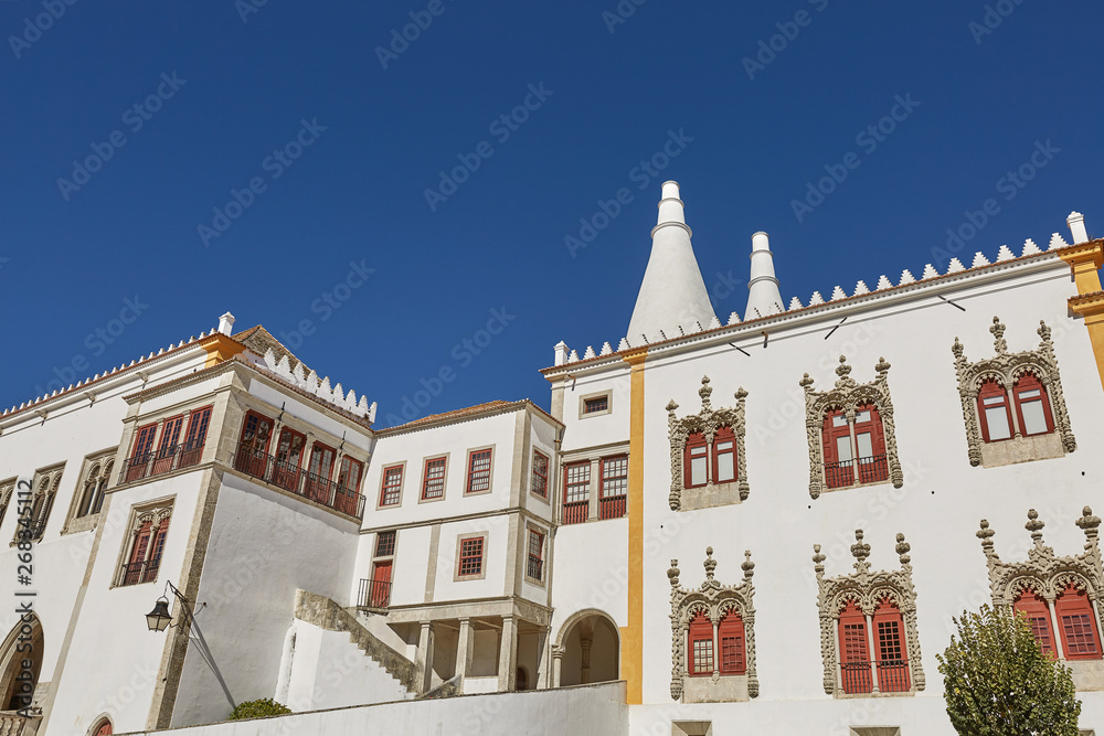 Obraz premium Palace of Sintra (Palacio Nacional de Sintra) in Sintra Portugal during a beautiful summer day.