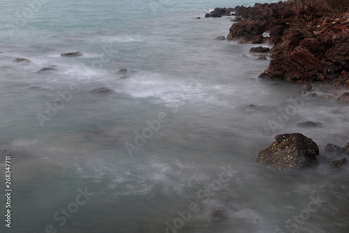 long exposure rocks and waves background