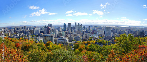Scenic view of the city of Montreal in Quebec  with colorful autumn foliage from the Chalet du Mont Royal  Mount Royal  Kondiaronk belvedere viewpoint.