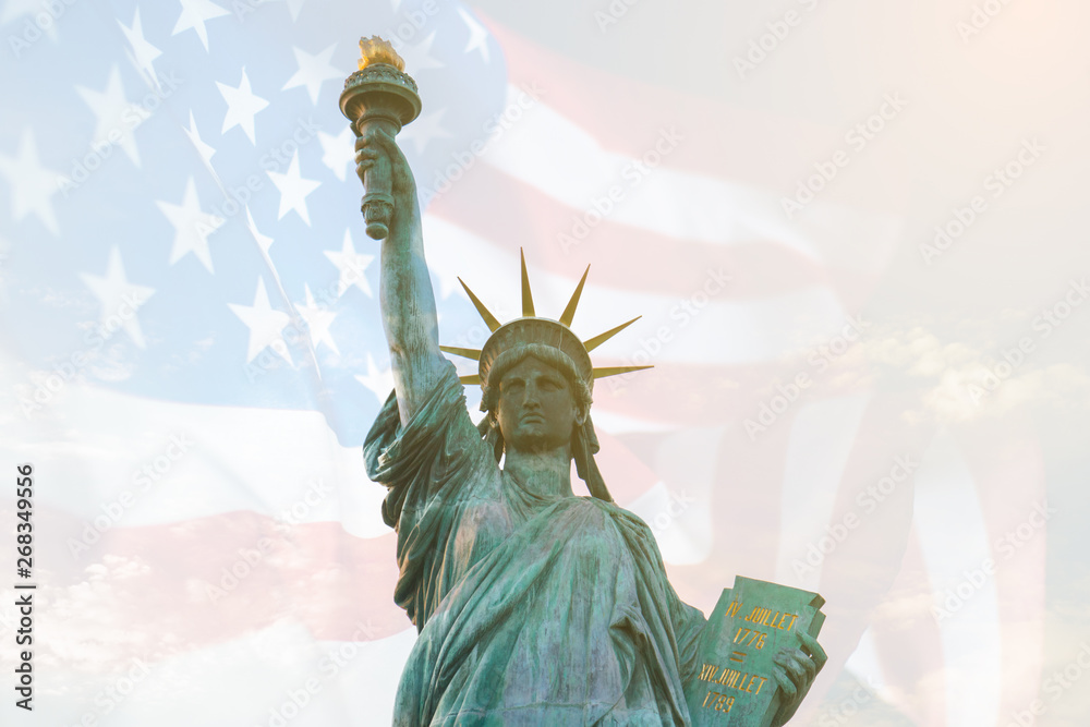 Obraz premium Image of double exposure statue of liberty and USA flag. Background for Independence day or Memorial day.