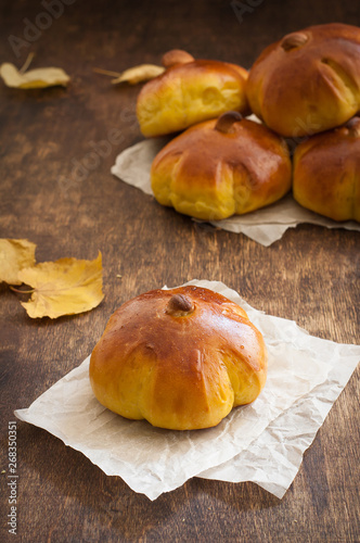 Homemade pumpkin bread buns. Autumn baked.