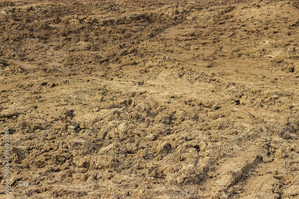 Clay is not fertile soil, background texture. Earth dirt clay soil Clay is not fertile soil, background texture. Earth dirt clay soil
