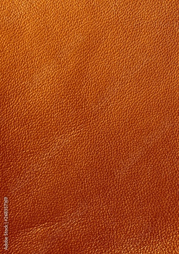 The texture of genuine leather. Impeccable and stylish background. Beautiful stylish background. Natural skin texture close up. Brown background.  The structure of the leather material brown shades. © Sagittarius_13