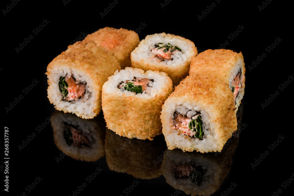 Sushi Roll - Maki Sushi pieces collection with Salmon Roe, Smoked Eel, Cucumber, Cream Cheese, Sesame, Avocado, Onion Fries, Crab Meat, Tobiko isolated on black background - Image Sushi Roll - Maki Sushi pieces collection with Salmon Roe, Smoked Eel, Cucumber, Cream Cheese, Sesame, Avocado, Onion Fries, Crab Meat, Tobiko isolated on black background - Image