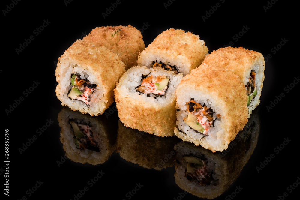 Sushi Roll - Maki Sushi pieces collection with Salmon Roe, Smoked Eel, Cucumber, Cream Cheese, Sesame, Avocado, Onion Fries, Crab Meat, Tobiko isolated on black background - Image Sushi Roll - Maki Sushi pieces collection with Salmon Roe, Smoked Eel, Cucumber, Cream Cheese, Sesame, Avocado, Onion Fries, Crab Meat, Tobiko isolated on black background - Image