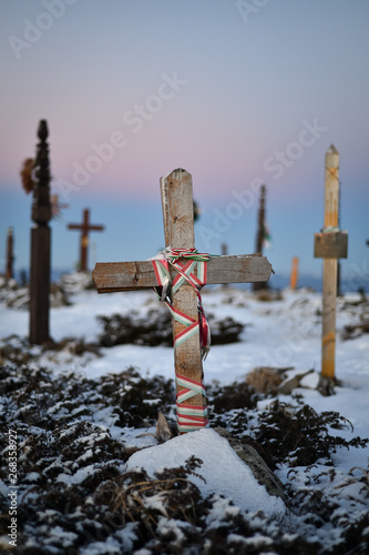 Wooden crosses on the top of a mountain in winter season