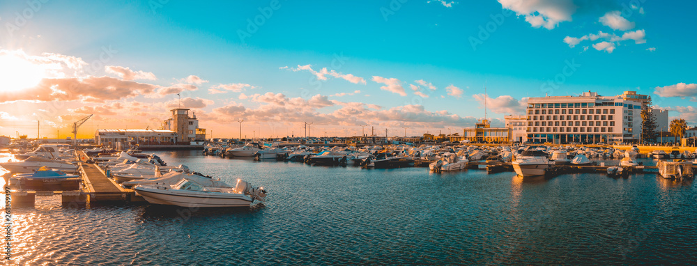 giant panorama of famouse port at faro, portugal in the evening