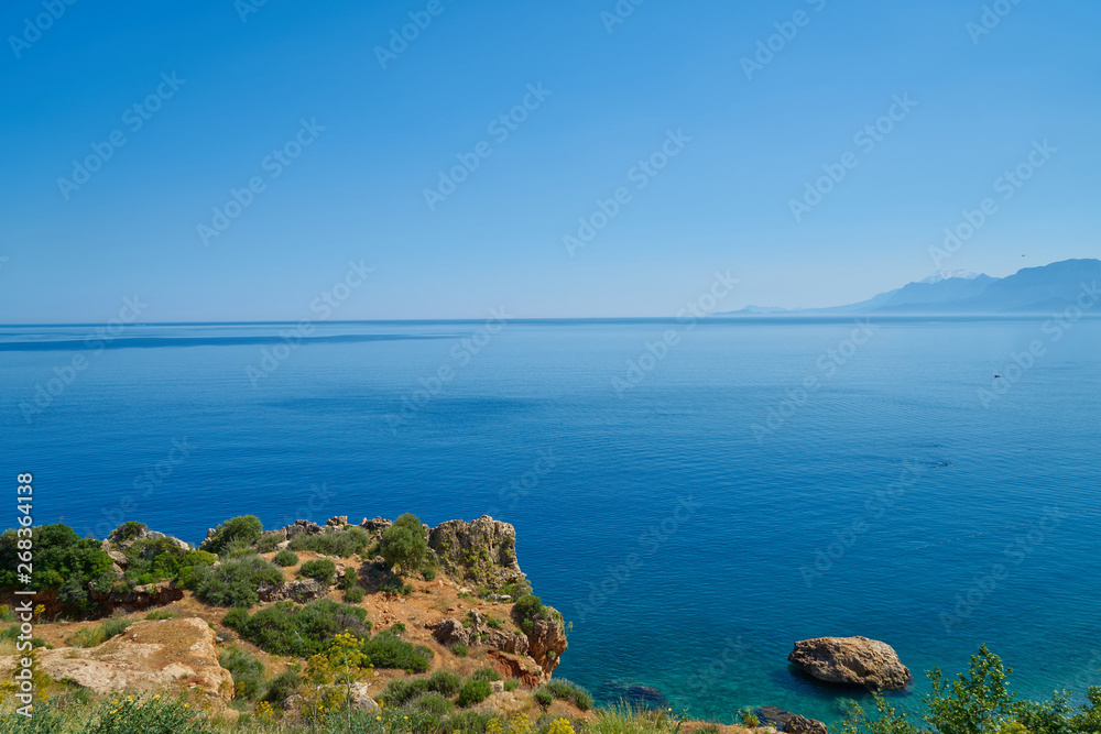 Fototapeta premium Rock and blue sea background