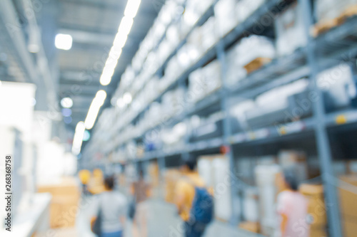 Wallpaper Mural Blurred bix box store supercenter with customers shopping for home goods. Torontodigital.ca