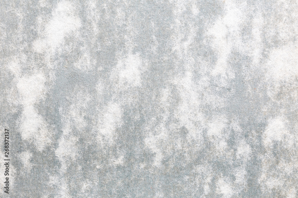 Old grunge grey paper background texture with stains 
