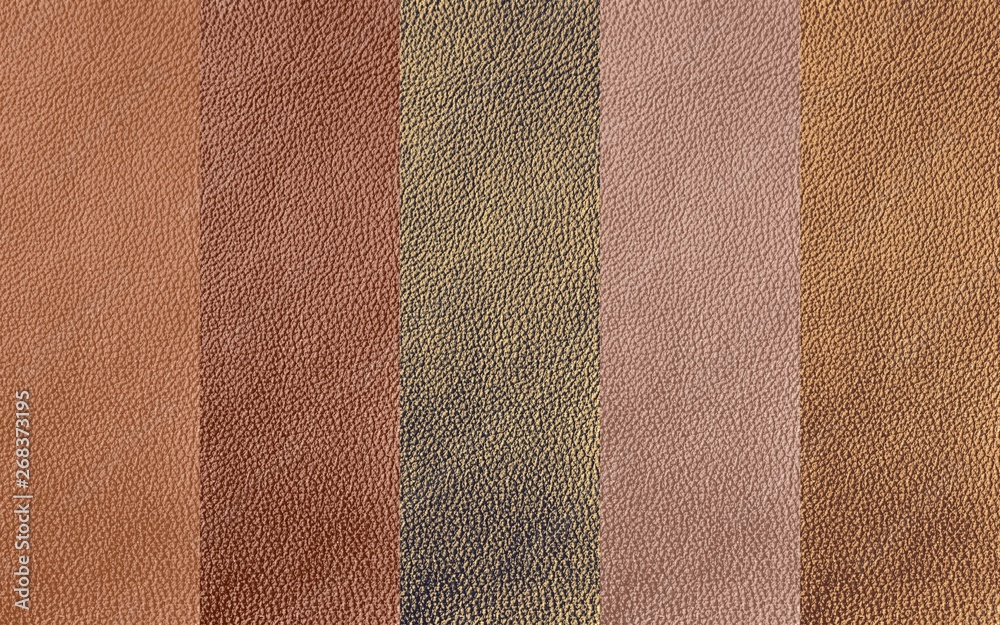 Fototapeta premium The texture of genuine leather. Impeccable and stylish background. Beautiful stylish background. Natural skin texture close up. Brown background. The structure of the leather material brown shades.