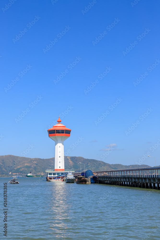 Ranong, Thailand - February 19, 2019: Lighthouse on Andaman sea, custom and immigration office at border to Myanmar.