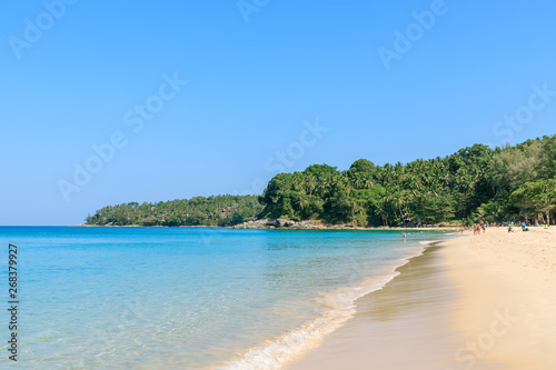 Crystal clear turquoise blue Andaman sea at Surin Beach, Phuket, Thailand