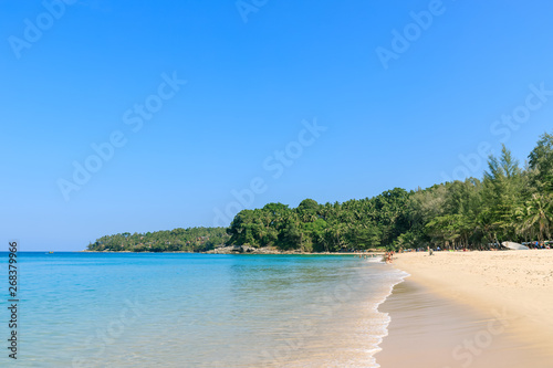 Crystal clear turquoise blue Andaman sea at Surin Beach, Phuket, Thailand © wirojsid