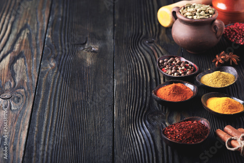 Wallpaper Mural Wooden table of colorful spices. Torontodigital.ca
