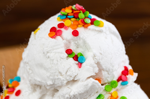 vanilla ice cream scoop swith sprinkles, close up