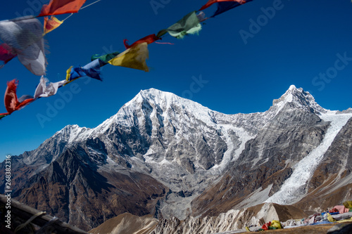 Himalayas peak of Langtang with prayer flags in foreground