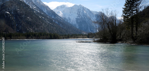 alpine lake called Lago del Predil in Italian Language in Northe photo