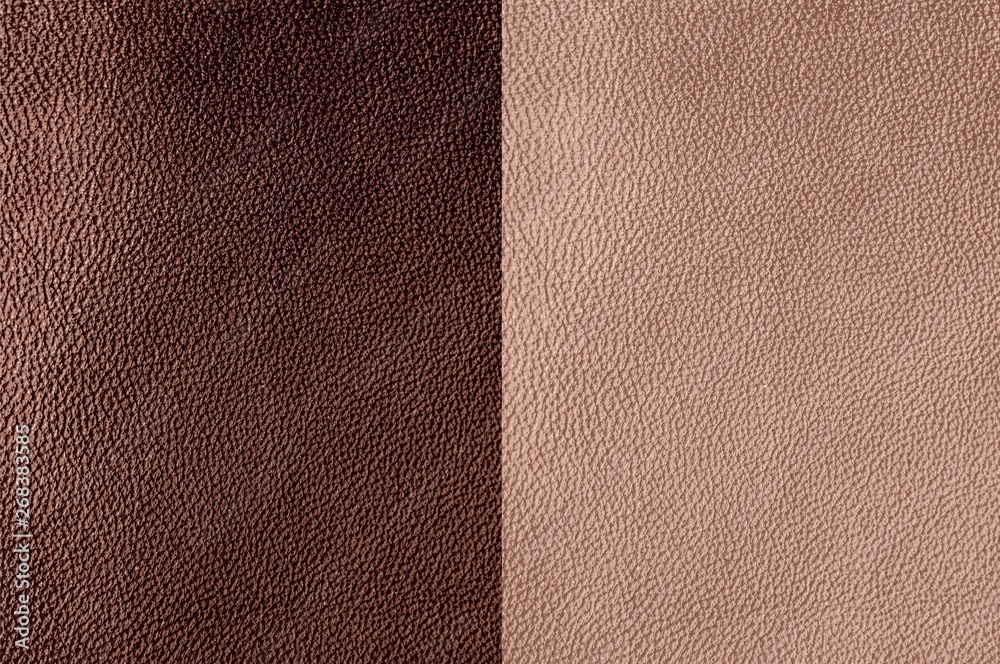 Fototapeta premium The texture of genuine leather. Impeccable and stylish background. Beautiful stylish background. Natural skin texture close up. Brown background. The structure of the leather material brown shades.