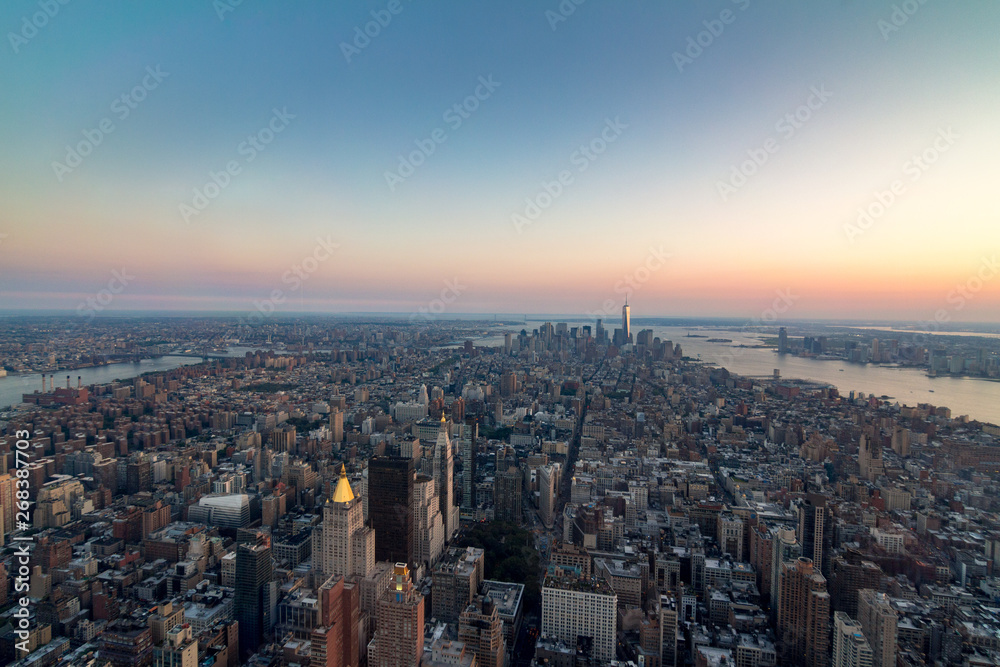 New york skyline during sunset from empire state building