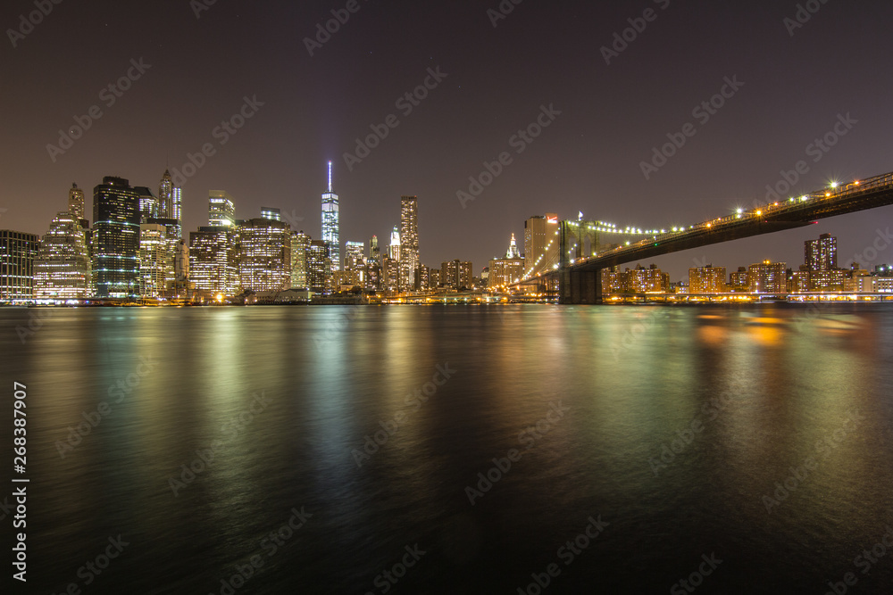 New york skyline during night from river