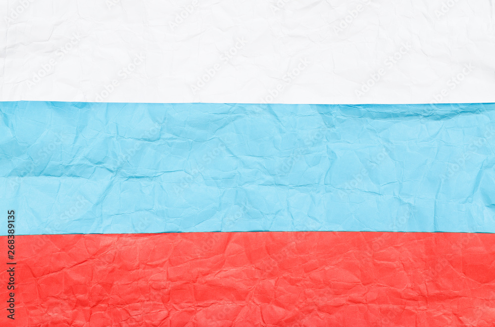 Flag of the Russian Federation made of white, blue and red crumpled paper