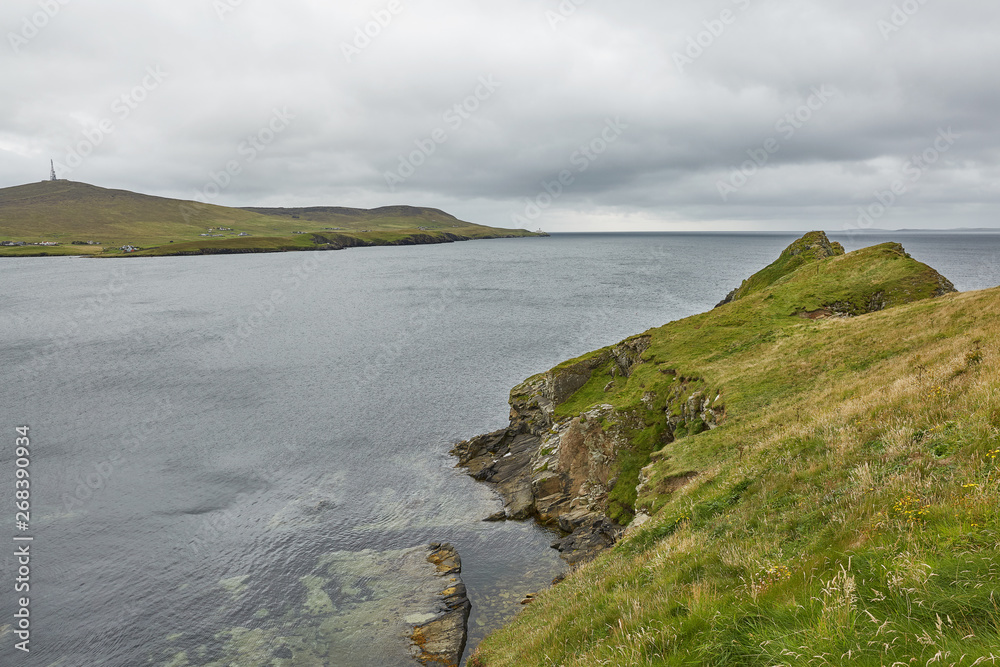 Coastal view toward the Knab in Lerwick, which is the main port on the Shetland Isles, Scotland.