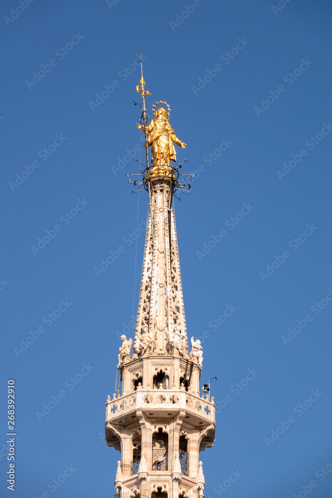 golden Madonna statue at Cathedral Milan Italy golden Madonna statue at Cathedral Milan Italy