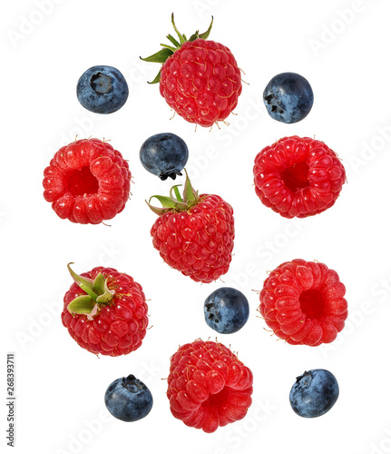 Fototapeta Naklejka Na Ścianę i Meble -  Fresh raspberry and blueberry  isolated on white background