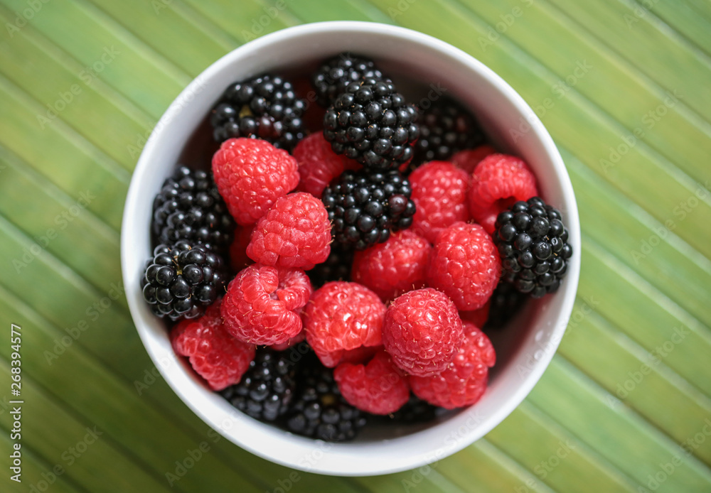 Raspberries and blackberries in a bowl Raspberries and blackberries in a bowl